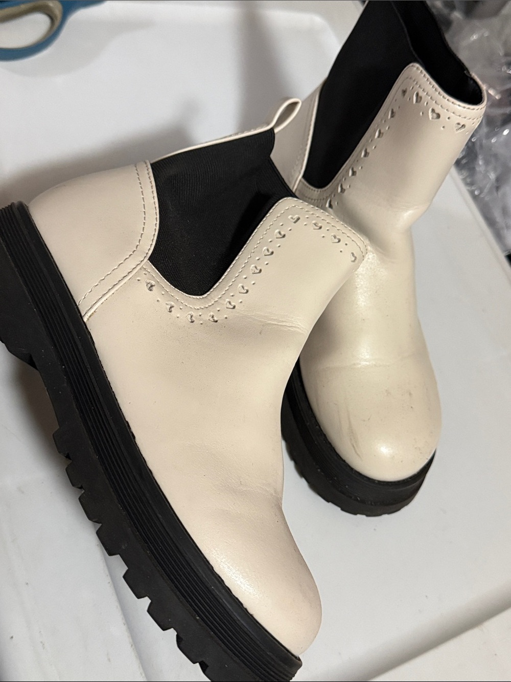 INC International Concepts Cream Chelsea Lug Booties with Heart Punch Detail